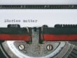 black-and-red-typewriter-1995842