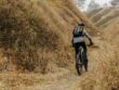 man-riding-bike-mountain-path (2) (1)